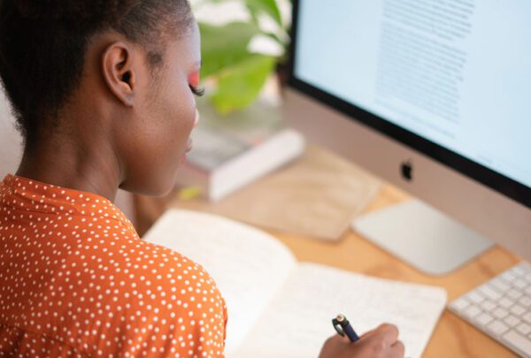 woman reviewing cover letter